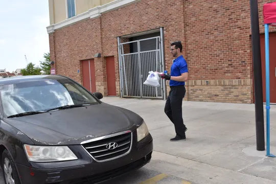 Grab and go! Pensacola Blue Wahoos roll out curbside cuisine to support local employment